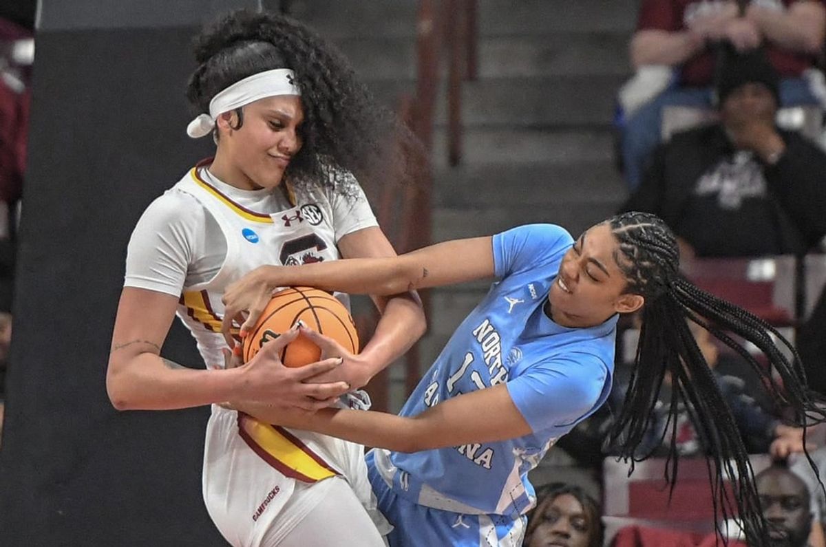 Mar 24, 2034; Columbia, So Carolina, USA;  South Carolina center Kamilla Cardoso (10) and University of North Carolina guard Teonni Key (13) try to get a rebound during the second quarter of the second round NCAA Women's Basketball Tournament game at the Colonial Life Center.