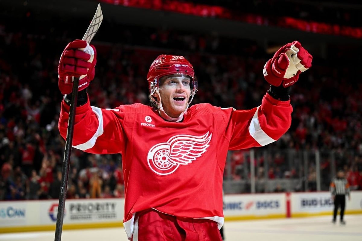 Apr 5, 2024; Detroit, Michigan, USA; Detroit Red Wings right wing Patrick Kane (88) celebrates center Dylan Larkin (not pictured) goal during the second period against the New York Rangers at Little Caesars Arena.