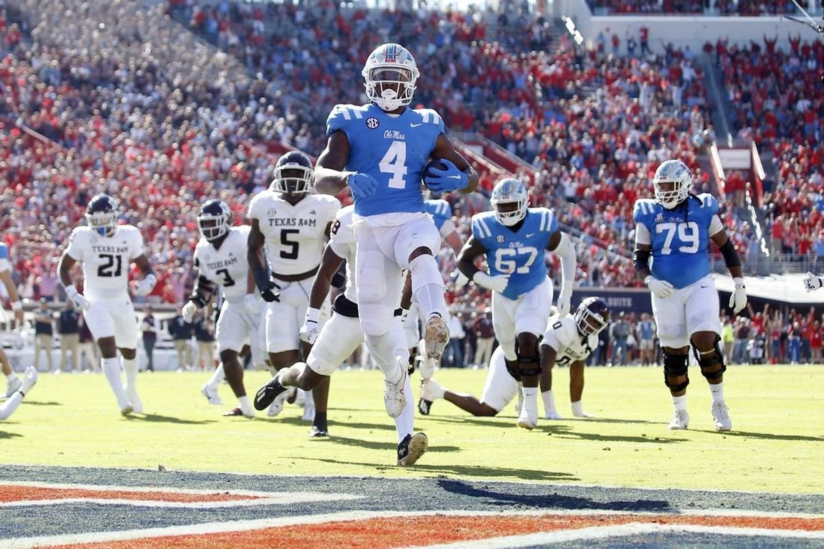 Nov 4, 2023; Oxford, Mississippi, USA; Mississippi Rebels running back Quinshon Judkins (4) runs the ball for a touchdown during the first half against the Texas A&M Aggies at Vaught-Hemingway Stadium.