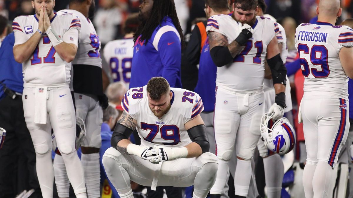 Buffalo Bills players waiting for news on Damar Hamlin’s condition after Hamlin suffered a cardiac arrest following a hit in last night’s game.