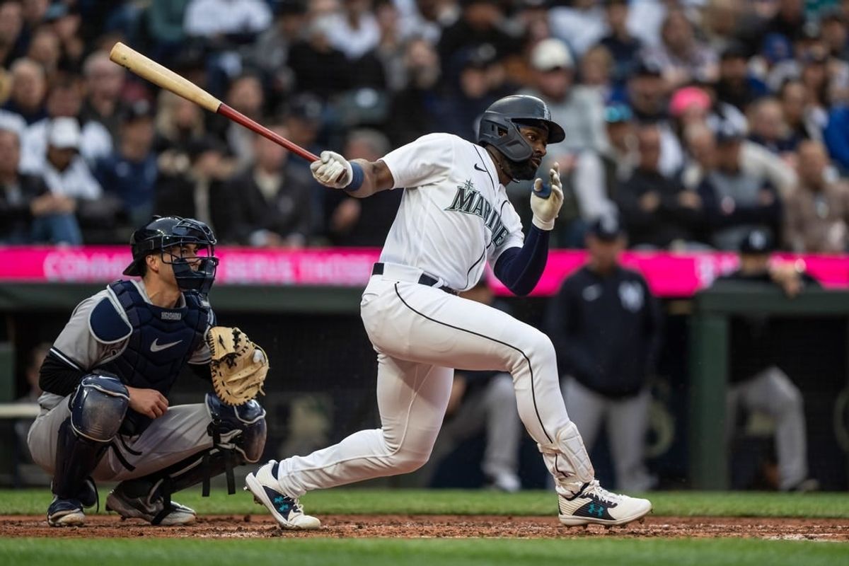 May 31, 2023; Seattle, Washington, USA; Seattle Mariners designated hitter Taylor Trammell (5) takes a swing during an at-bat against the New York Yankees at T-Mobile Park.