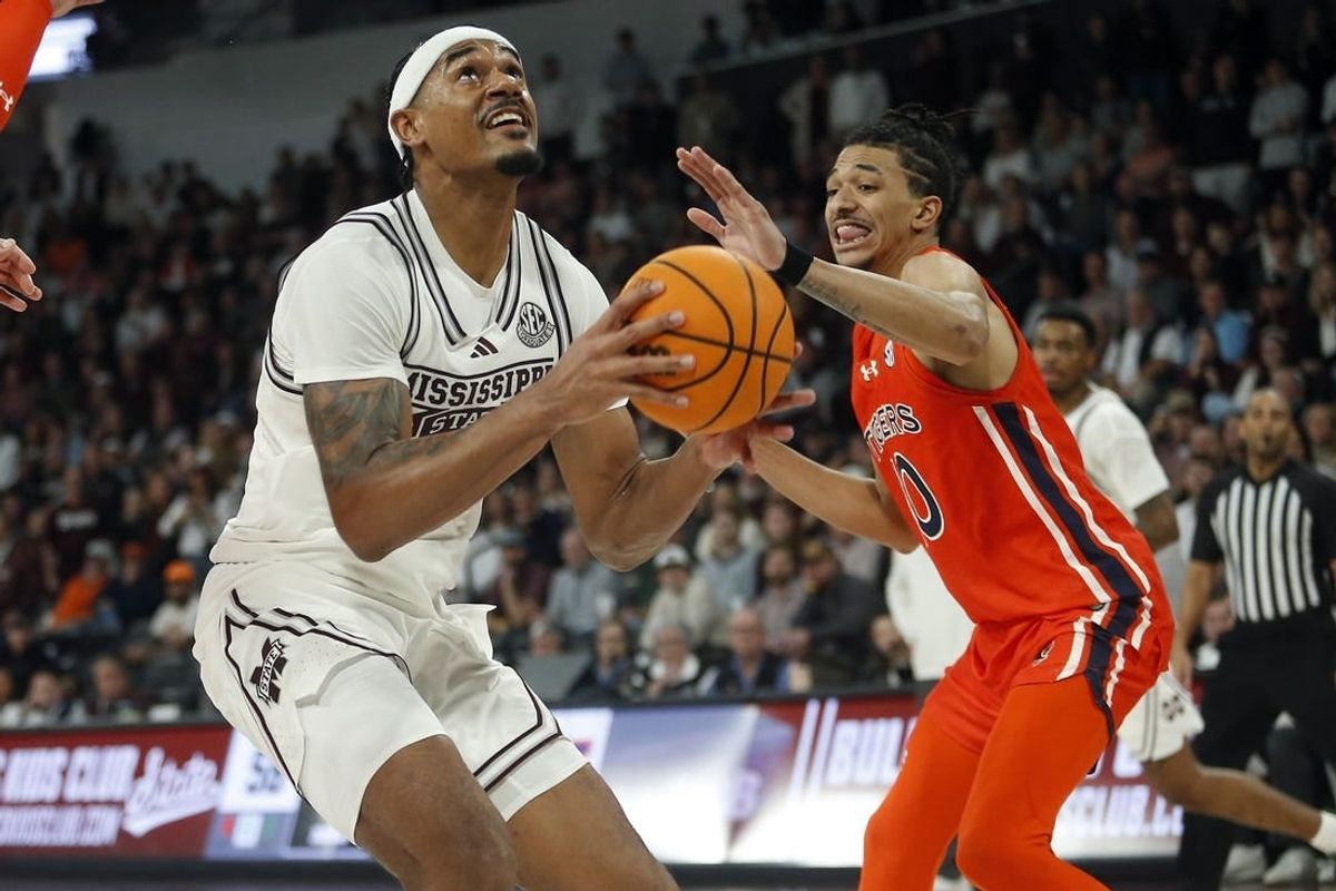 Jan 27, 2024; Starkville, Mississippi, USA; Mississippi State Bulldogs forward Tolu Smith (1) shoots as Auburn Tigers guard/forward Chad Baker-Mazara (10) defends during the second half at Humphrey Coliseum.