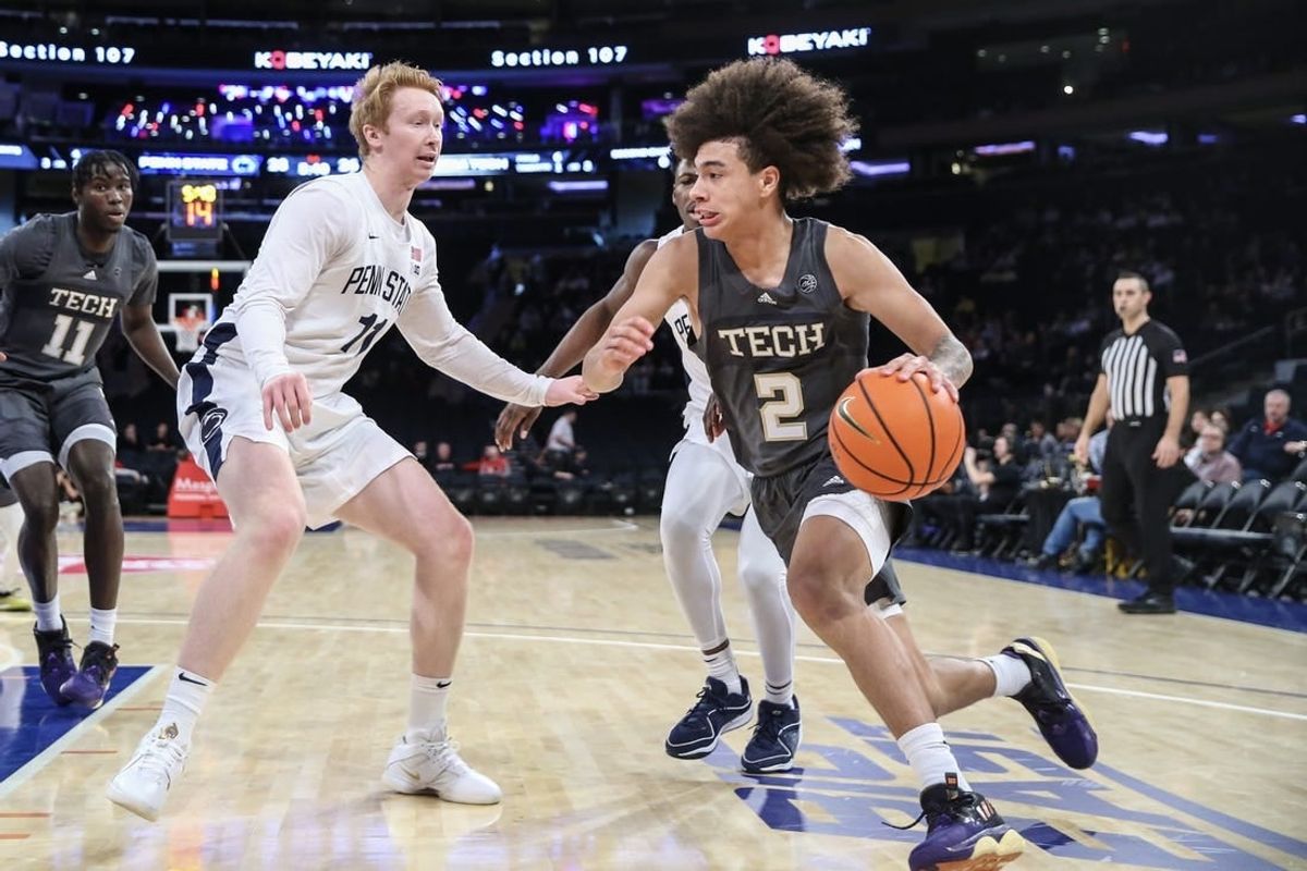 Dec 16, 2023; New York, New York, USA;  Georgia Tech Yellow Jackets guard Naithan George (2) drives past Penn State Nittany Lions forward Leo O'Boyle (11) in the first half at Madison Square Garden.