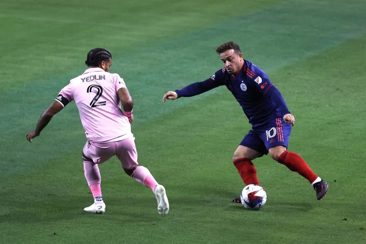 Oct 4, 2023; Chicago, Illinois, USA; Chicago Fire midfielder Xherdan Shaqiri (10) controls the ball during the first half while defended by Inter Miami CF defender DeAndre Yedlin (2) at Soldier Field.