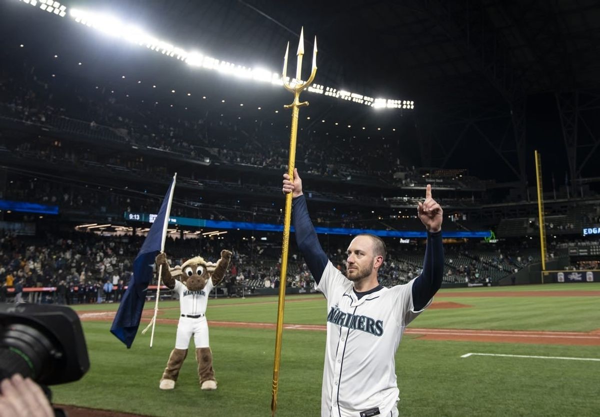 Apr 29, 2024; Seattle, Washington, USA; Seattle Mariners designated hitter Mitch Garver (18) celebrates after a game against the Atlanta Braves at T-Mobile Park.