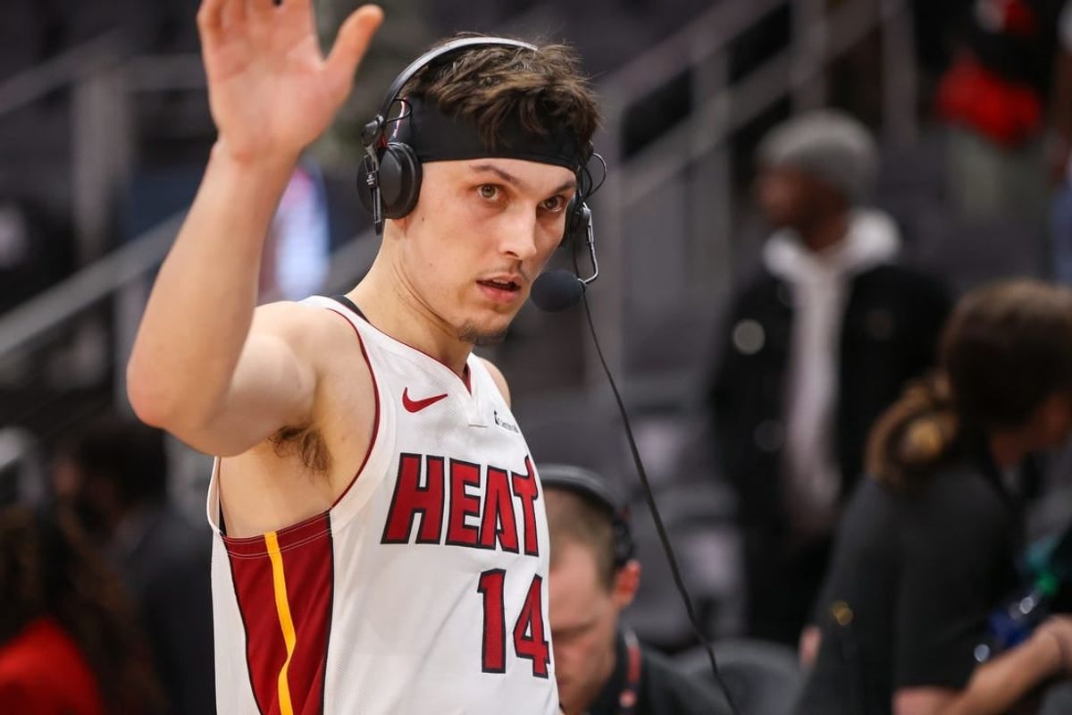 Apr 9, 2024; Atlanta, Georgia, USA; Miami Heat guard Tyler Herro (14) does an interview after a victory against the Atlanta Hawks at State Farm Arena.