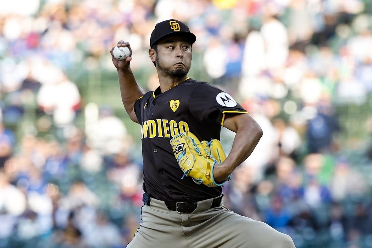 May 6, 2024; Chicago, Illinois, USA; San Diego Padres starting pitcher Yu Darvish (11) delivers a pitch against the Chicago Cubs during the first inning at Wrigley Field.