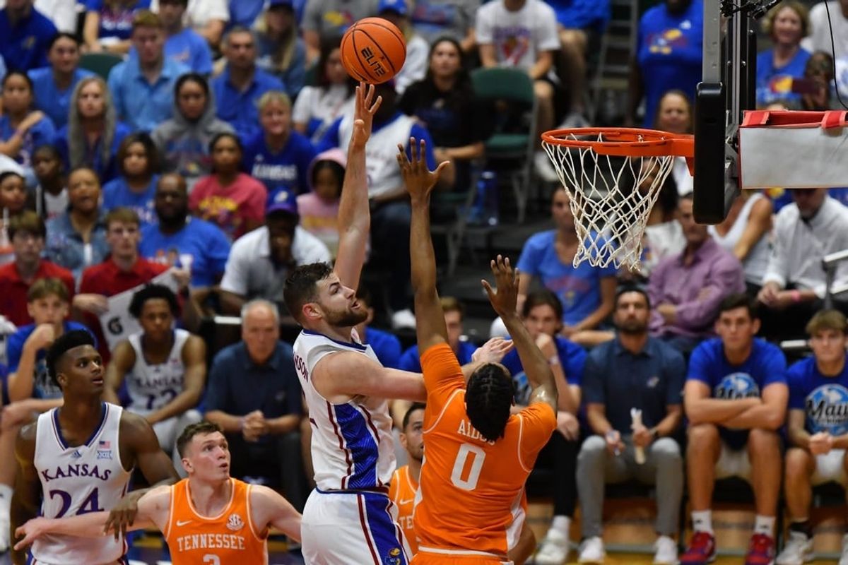 Nov 22, 2023; Honolulu, HI, USA;  Kansas Jayhawks center Hunter Dickinson (1) shoots the ball while defended by Tennessee Volunteers forward Jonas Aidoo (0) during the second half at SimpliFi Arena at Stan Sheriff Center.