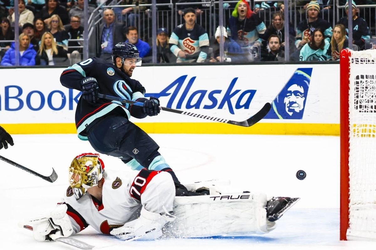 Jan 4, 2024; Seattle, Washington, USA; Seattle Kraken left wing Tomas Tatar (90) scores a goal against Ottawa Senators goaltender Joonas Korpisalo (70) during the second period at Climate Pledge Arena.