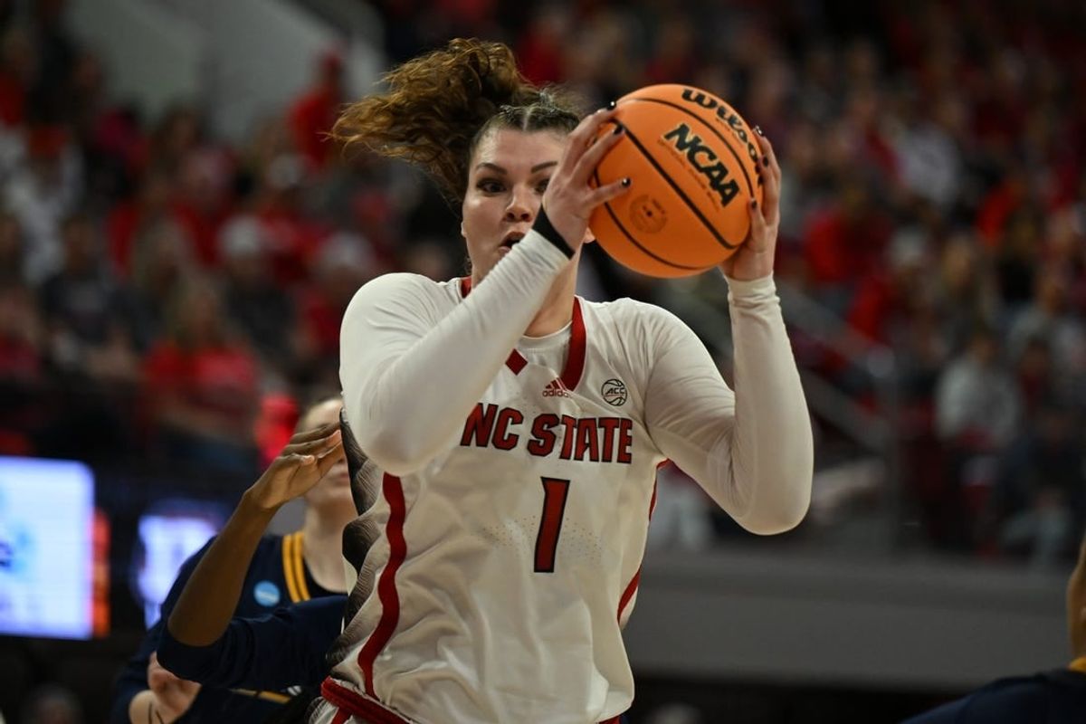 Mar 23, 2024; Raleigh, North Carolina, USA; NC State Wolfpack center River Baldwin (1) grabs a rebound in the first round of the 2024 NCAA Women's Tournament at James T. Valvano Arena at William Neal Reynolds.