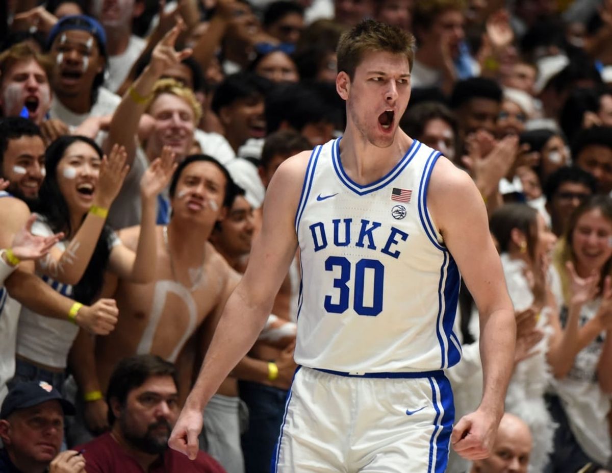 Nov 10, 2023; Durham, North Carolina, USA;  Duke Blue Devils center Kyle Filipowski(30) reacts to scoring during the second half against the Arizona Wildcats at Cameron Indoor Stadium.
