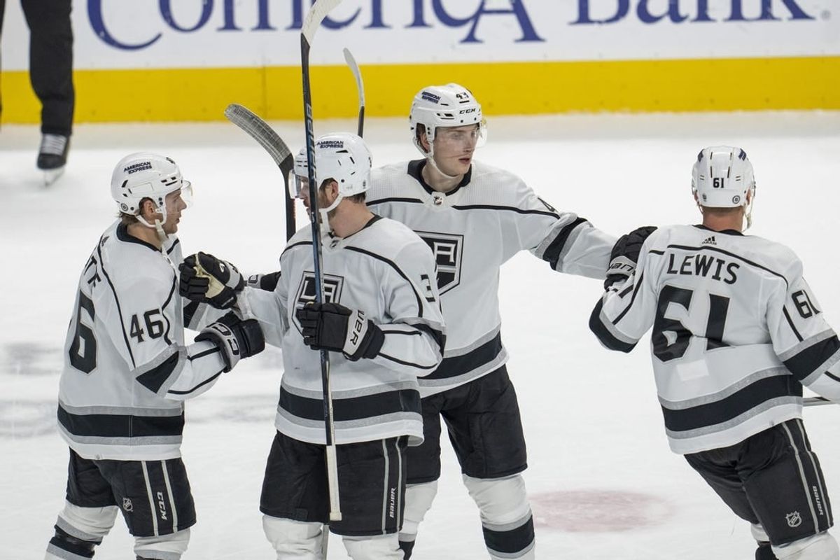 Dec 19, 2023; San Jose, California, USA; Los Angeles Kings center Trevor Lewis (61), center Blake Lizotte (46), defenseman Jacob Moverare (43) and defenseman Matt Roy (3) celebrate after a goal during the third period against the San Jose Sharks at SAP Center at San Jose.