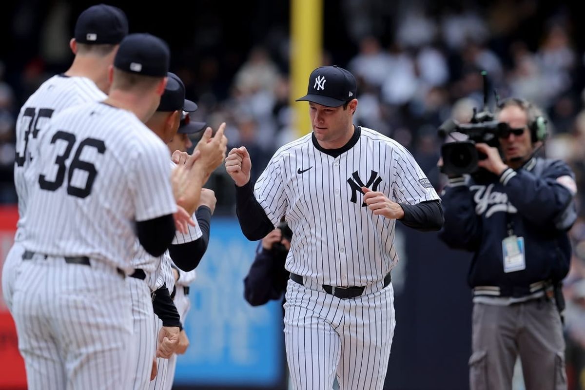 Apr 5, 2024; Bronx, New York, USA; New York Yankees injured starting pitcher Gerrit Cole (45) is introduced before an opening day game against the Toronto Blue Jays at Yankee Stadium.