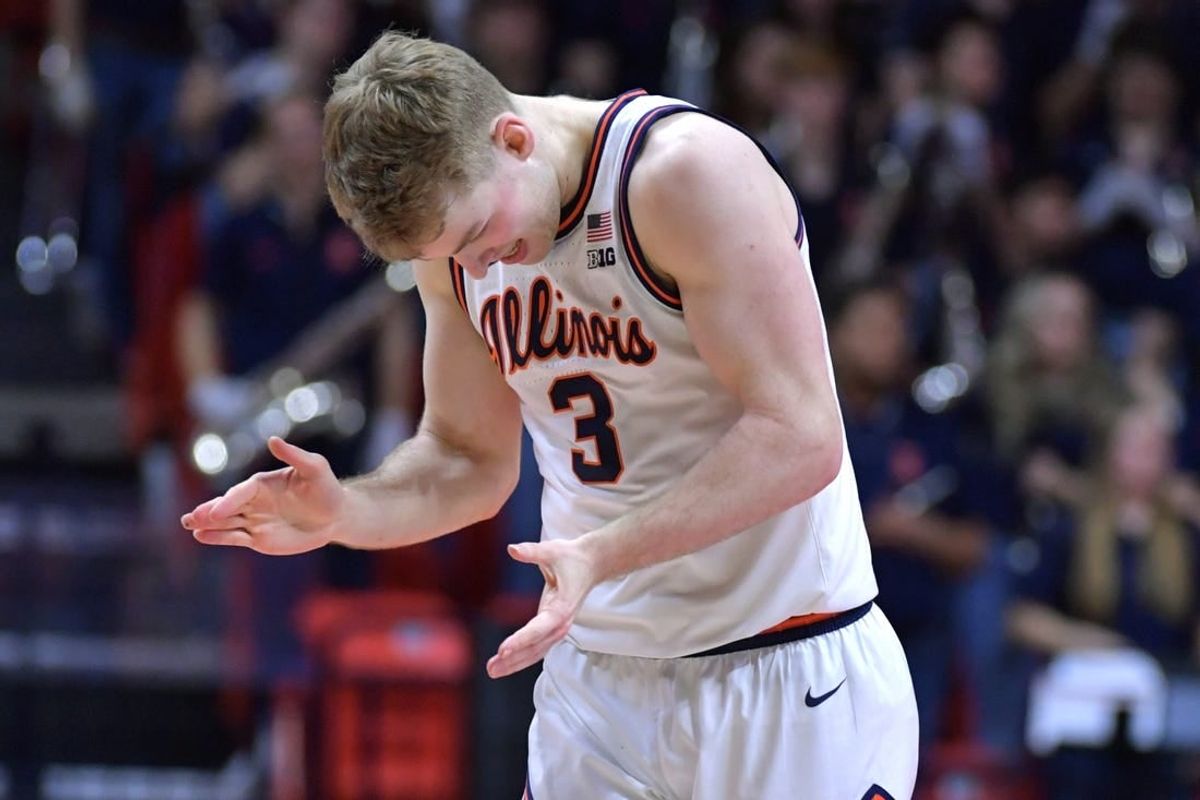 Jan 14, 2024; Champaign, Illinois, USA;  Illinois Fighting Illini guard Marcus Domask (3) slaps his hands after a turnover during the second half against the Maryland Terrapins at State Farm Center.