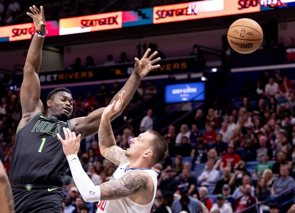 Mar 15, 2024; New Orleans, Louisiana, USA;  New Orleans Pelicans forward Zion Williamson (1) is fouled by LA Clippers center Daniel Theis (10) during the first half at Smoothie King Center.