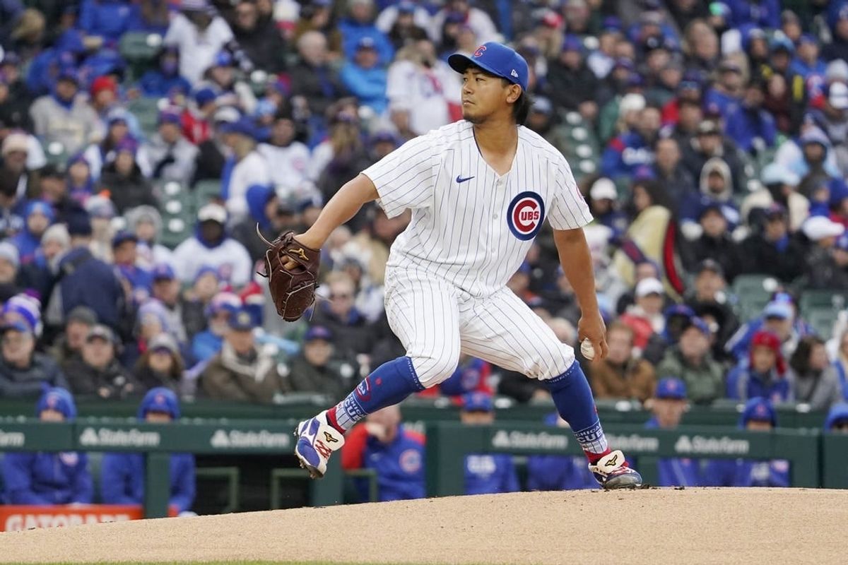Apr 1, 2024; Chicago, Illinois, USA; Chicago Cubs starting pitcher Shota Imanaga (18) pitches against the Colorado Rockies during the first inning at Wrigley Field.