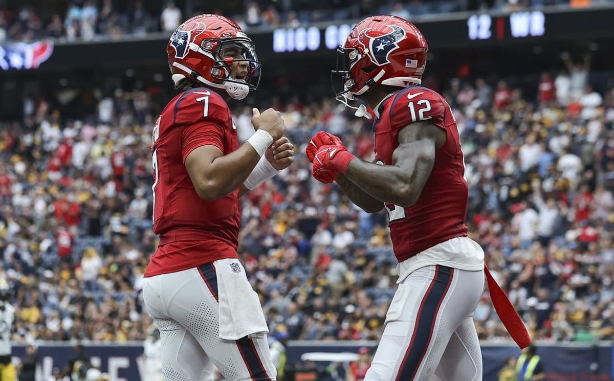 Oct 1, 2023; Houston, Texas, USA; Houston Texans quarterback C.J. Stroud (7) celebrates with wide receiver Nico Collins (12) after a touchdown during the game against the Pittsburgh Steelers at NRG Stadium.