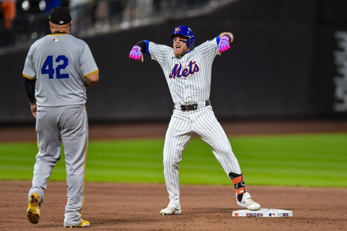 Apr 15, 2024; New York City, New York, USA; New York Mets outfielder Harrison Bader reacts after hitting a two RBI double against the Pittsburgh Pirates during the eighth inning at Citi Field.