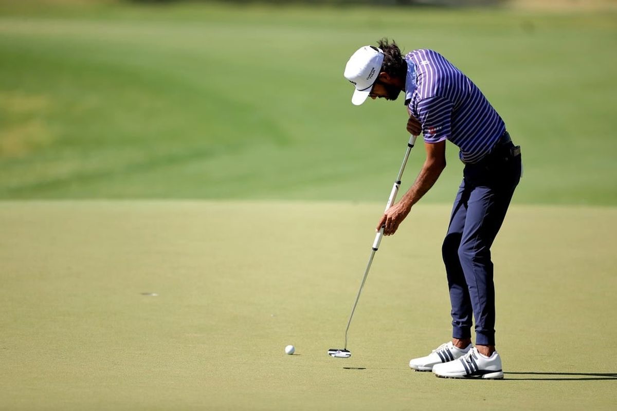 Apr 5, 2024; San Antonio, Texas, USA; Akshay Bhatia putts on the 18th hole during the second round of the Valero Texas Open golf tournament.
