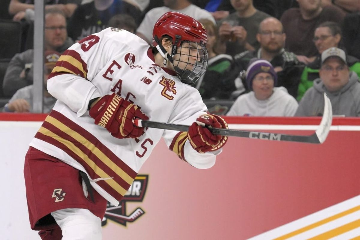 Apr 13, 2024; Saint Paul, Minnesota, USA; Boston College Eagles forward Cutter Gauthier (19) takes a shot on goal against the Denver Pioneers during the first period of the championship game of the 2024 Frozen Four college ice hockey tournament at Xcel Energy Center.