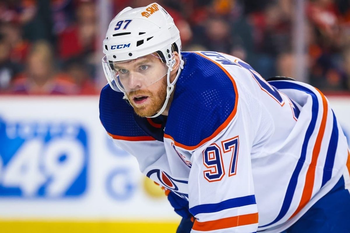 Apr 6, 2024; Calgary, Alberta, CAN; Edmonton Oilers center Connor McDavid (97) during the face off against the Calgary Flames during the first period at Scotiabank Saddledome.