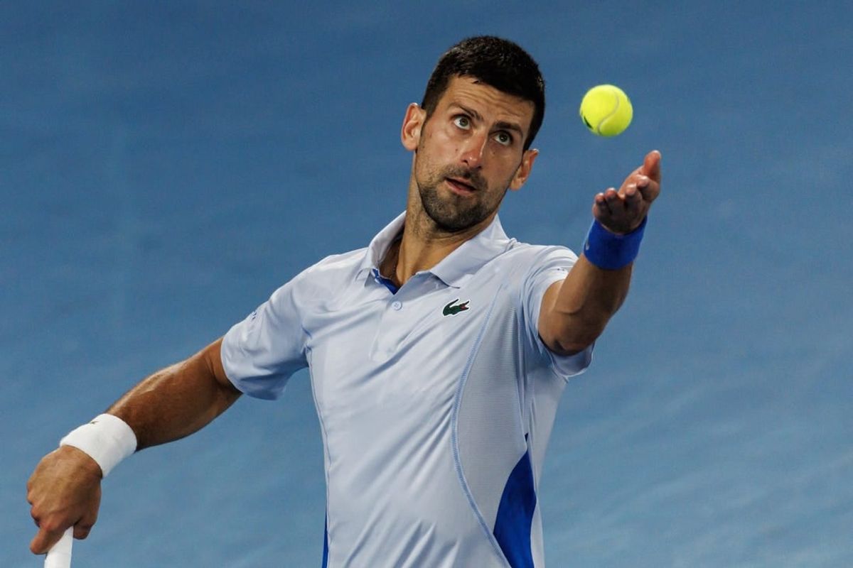 Jan 21, 2024; Melbourne, Victoria, Australia; Novak Djokovic of Serbia hits a shot against Adrian Mannarino of France in the forth round of the men s singles at the Australian Open 2024.