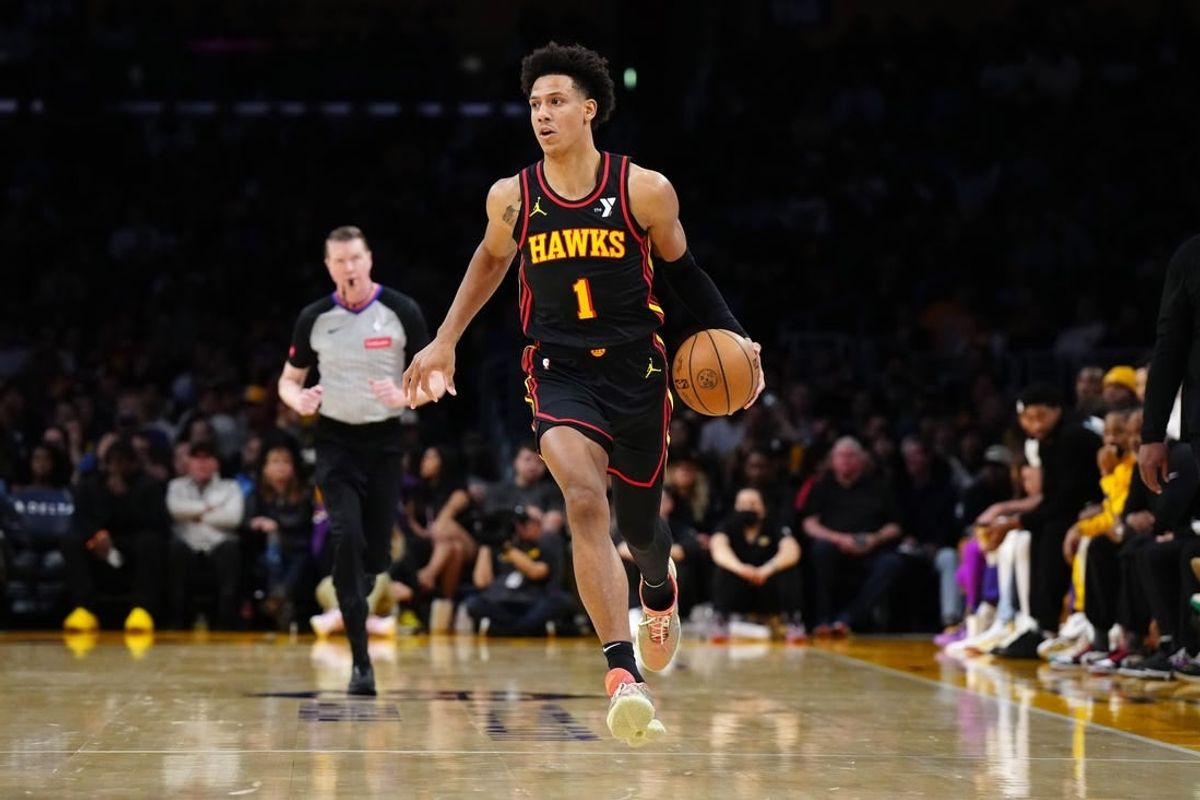Mar 18, 2024; Los Angeles, California, USA; Atlanta Hawks forward Jalen Johnson (1) dribbles the ball against the Los Angeles Lakers in the first half at Crypto.com Arena.