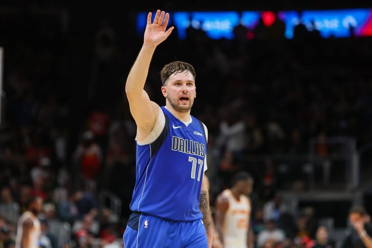 Jan 26, 2024; Atlanta, Georgia, USA; Dallas Mavericks guard Luka Doncic (77) waves to the crowd against the Atlanta Hawks in the fourth quarter at State Farm Arena.