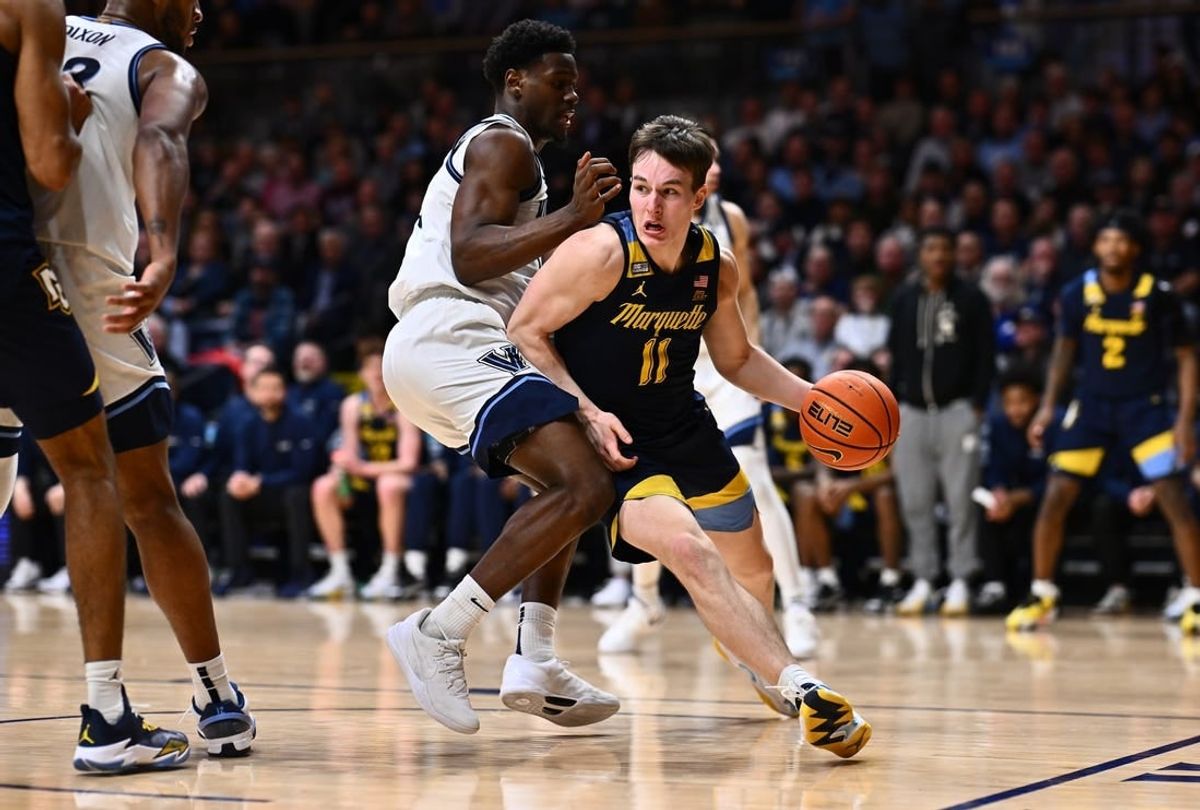 Jan 30, 2024; Villanova, Pennsylvania, USA; Marquette Golden Eagles guard Tyler Kolek (11) drives against Villanova Wildcats guard TJ Bamba (0) in the second half at William B. Finneran Pavilion.