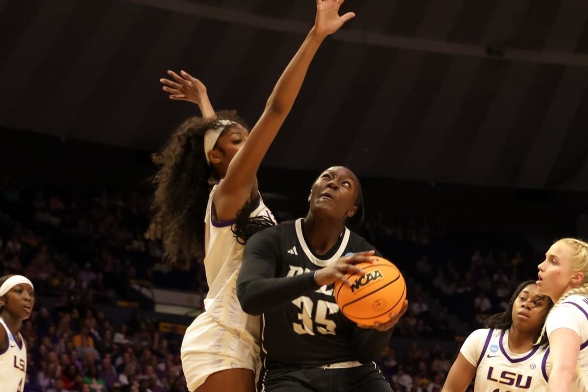 Mar 22, 2024; Baton Rouge, Louisiana, USA; LSU Lady Tigers forward Angel Reese (10) blocks the shot attempt by Rice Owls center Sussy Ngulefac (35) during the first half at Pete Maravich Assembly Center.