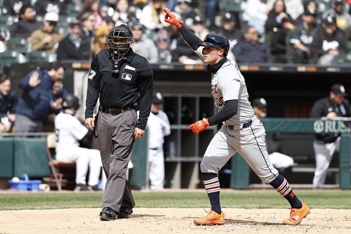 Mar 31, 2024; Chicago, Illinois, USA; Detroit Tigers right fielder Kerry Carpenter (30) crosses home plate after hitting a solo home run against the Chicago White Sox during the fourth inning at Guaranteed Rate Field.