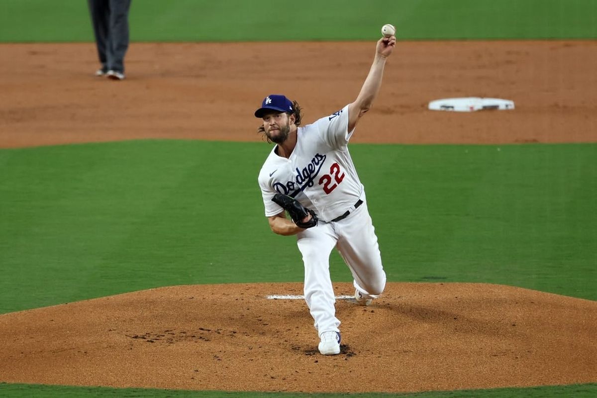 Oct 7, 2023; Los Angeles, California, USA; Los Angeles Dodgers starting pitcher Clayton Kershaw (22) throws a pitch against the Arizona Diamondbacks during the first inning for game one of the NLDS for the 2023 MLB playoffs at Dodger Stadium.