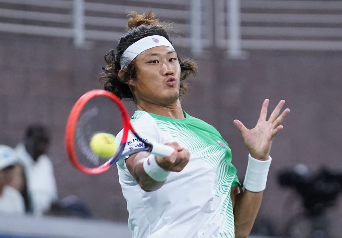 Aug 30, 2023; Flushing, NY, USA; Zhizhen Zhang of China hits to Casper Ruud of Norway on day three of the 2023 U.S. Open Tennis Championships at USTA Billie Jean King National Tennis Center.