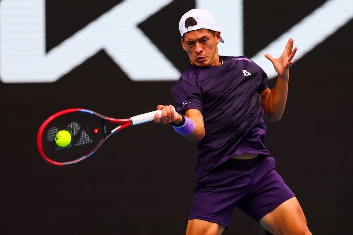 Jan 19, 2024; Melbourne, Victoria, Australia; Sebastian Baez of Argentina plays a shot against Jannik Sinner (not pictured) of Italy in Round 3 of the Men's Singles on Day 6 of the Australian Open tennis at Margaret Court Arena.