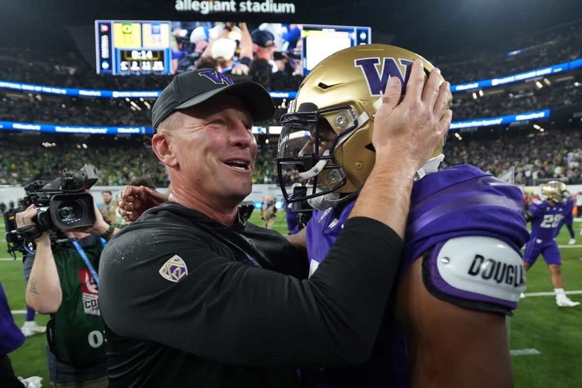 Dec 1, 2023; Las Vegas, NV, USA; Washington Huskies head coach Kalen DeBoer and quarterback Michael Penix Jr. (9) celebrate after the Pac-12 Championship game against the Oregon Ducks Allegiant Stadium.
