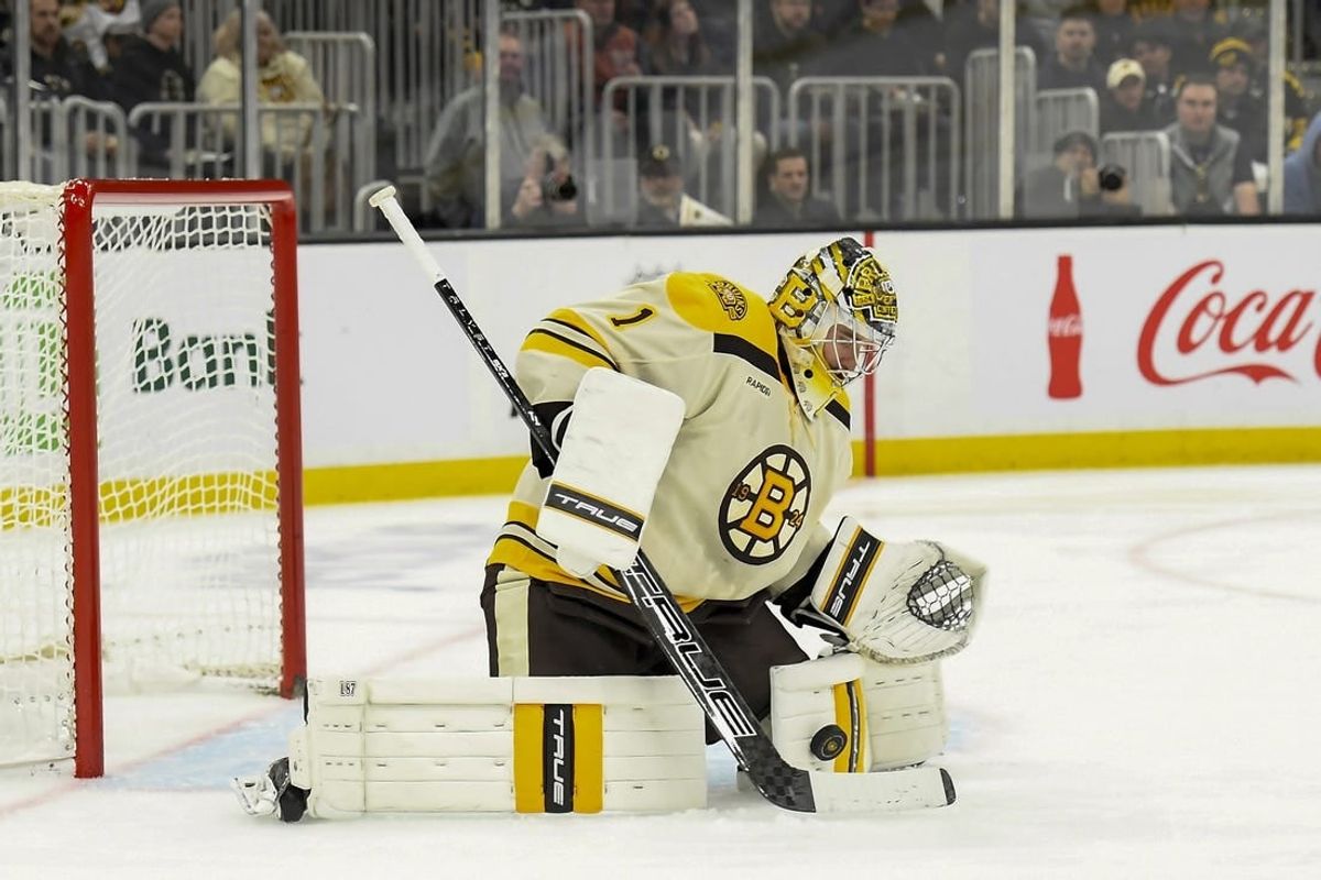 Dec 16, 2023; Boston, Massachusetts, USA;  Boston Bruins goaltender Jeremy Swayman (1) makes a save during the second period against the New York Rangers at TD Garden.