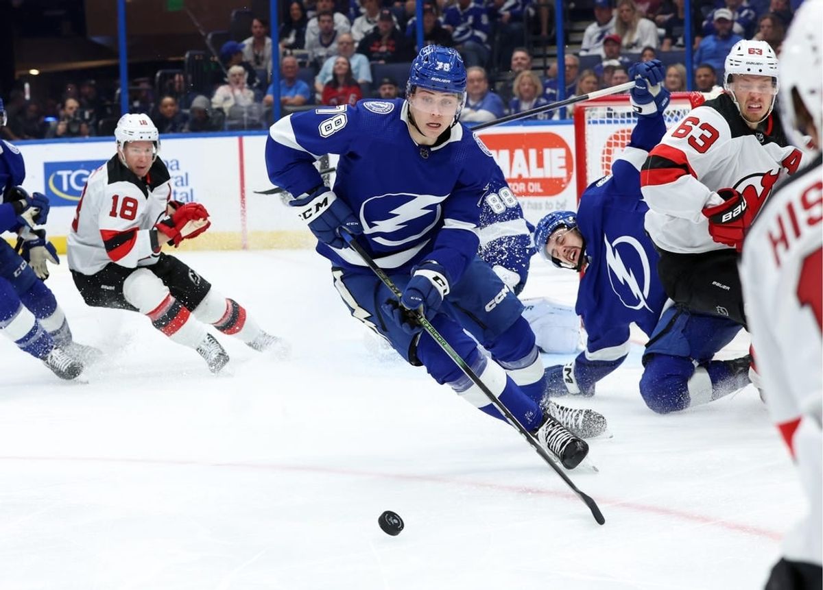 Jan 27, 2024; Tampa, Florida, USA; Tampa Bay Lightning defenseman Emil Martinsen Lilleberg (78) skates with the puck against the New Jersey Devils during the second period at Amalie Arena.