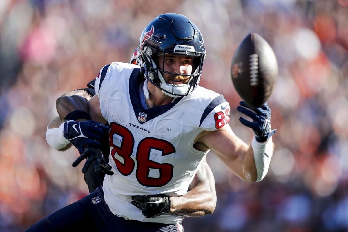 Nov 12, 2023; Cincinnati, Ohio, USA;  Houston Texans tight end Dalton Schultz (86) attempts to catch a pass against Cincinnati Bengals safety Dax Hill (23) in the first half at Paycor Stadium.