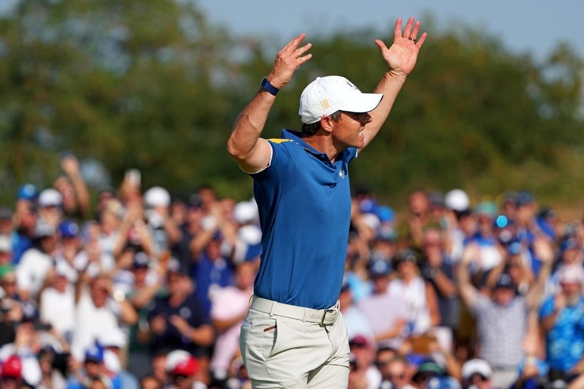 Rory McIlroy reacts to his putt on the 15th green during the final day of the 44th Ryder Cup golf competition at Marco Simone Golf and Country Club.