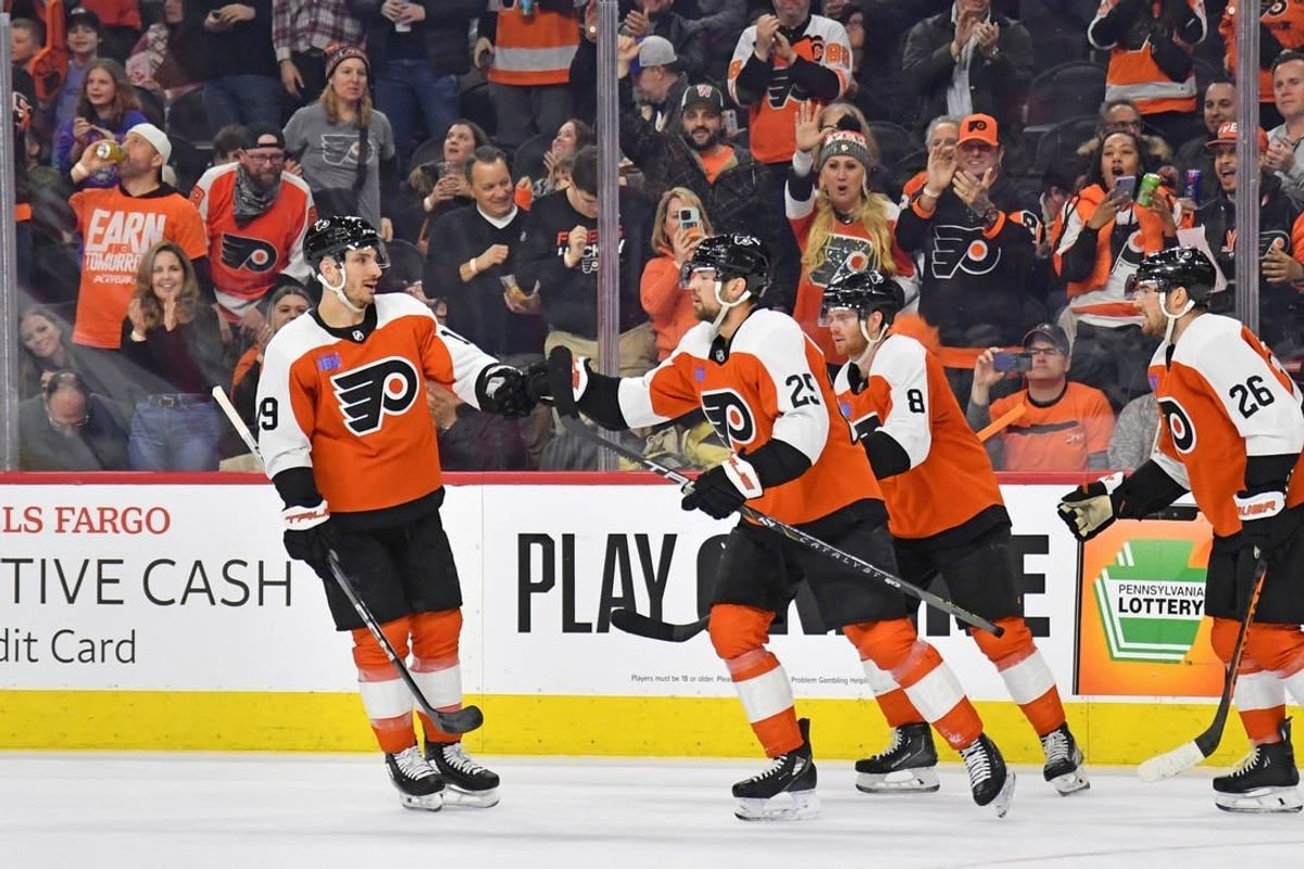 Feb 10, 2024; Philadelphia, Pennsylvania, USA; Philadelphia Flyers center Ryan Poehling (25) celebrates his goal with right wing Garnet Hathaway (19) against the Seattle Kraken during the first period at Wells Fargo Center.