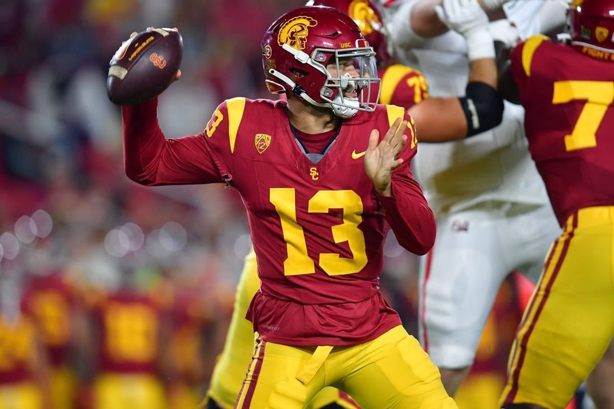 Oct 7, 2023; Los Angeles, California, USA; Southern California Trojans quarterback Caleb Williams (13) throws against the Arizona Wildcats during the first half at Los Angeles Memorial Coliseum.