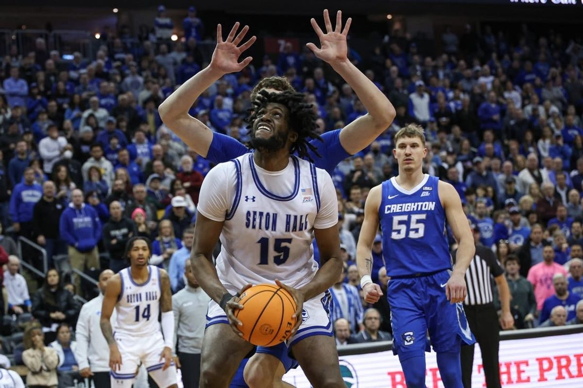 Jan 20, 2024; Newark, New Jersey, USA; Seton Hall Pirates center Jaden Bediako (15) looks to shoot as Creighton Bluejays center Ryan Kalkbrenner (11) defends during the second half at Prudential Center.