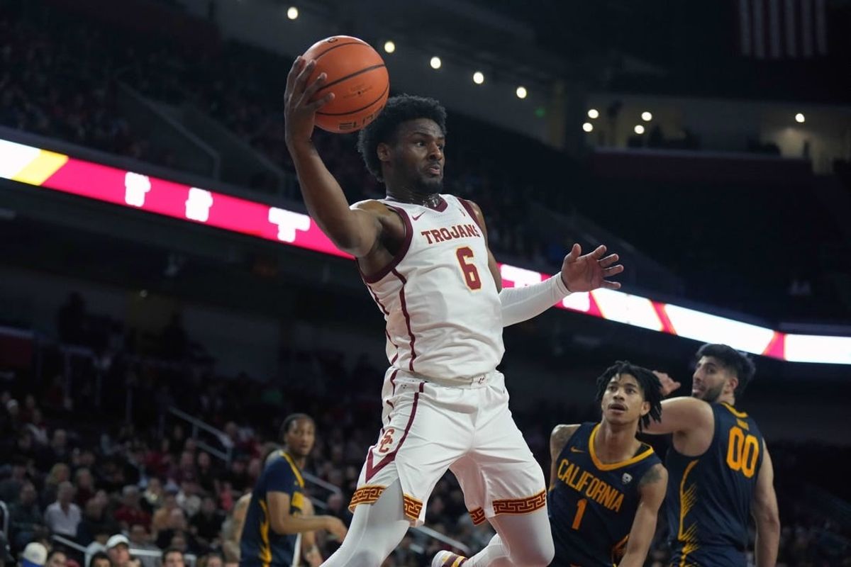 Jan 3, 2024; Los Angeles, California, USA; Southern California Trojans guard Bronny James (6) passes the ball in the second half against the California Golden Bears at Galen Center.