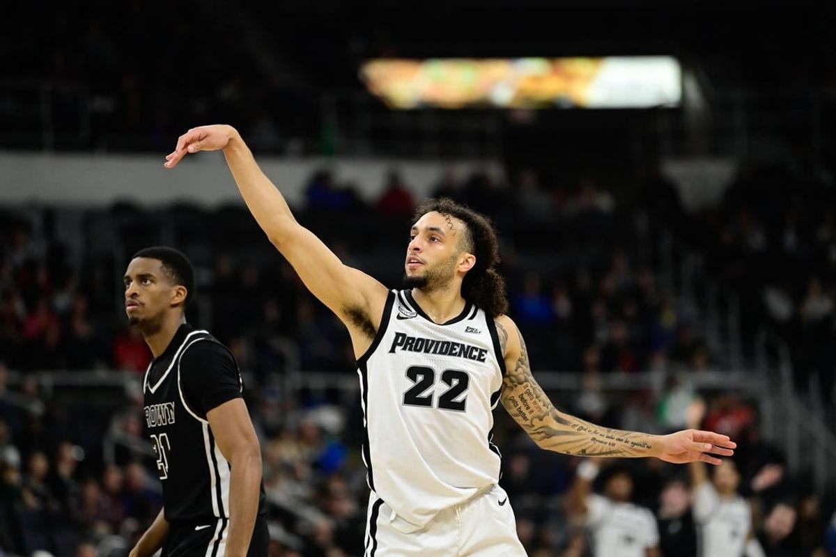 Dec 10, 2023; Providence, Rhode Island, USA;  Providence Friars guard Devin Carter (22) shoots for a three point basket during the first half against the Brown Bears at Amica Mutual Pavilion.