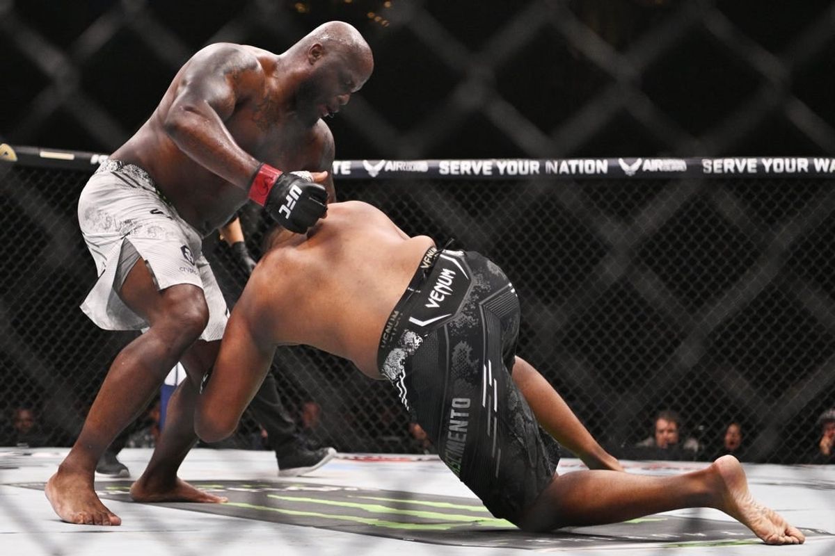 May 11, 2024; St. Louis, Missouri, USA; Derrick Lewis (red gloves) fights Rodrigo Nascimento (blue gloves) during UFC Fight Night at Enterprise Center.