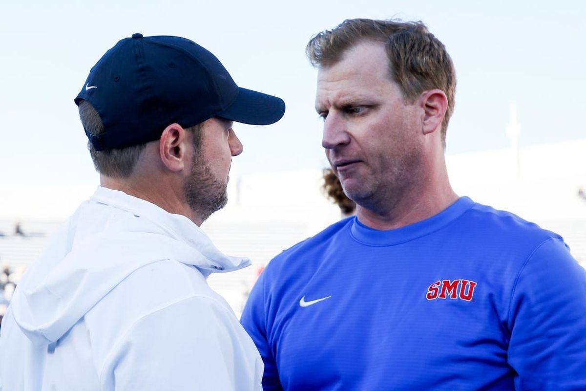 Memphis' head coach Ryan Silverfield and SMU head coach Rhett Lashlee speak after Memphis lost to SMU 38-34 at Simmons Bank Liberty Stadium in Memphis, Tenn., on Saturday, November 18, 2023.