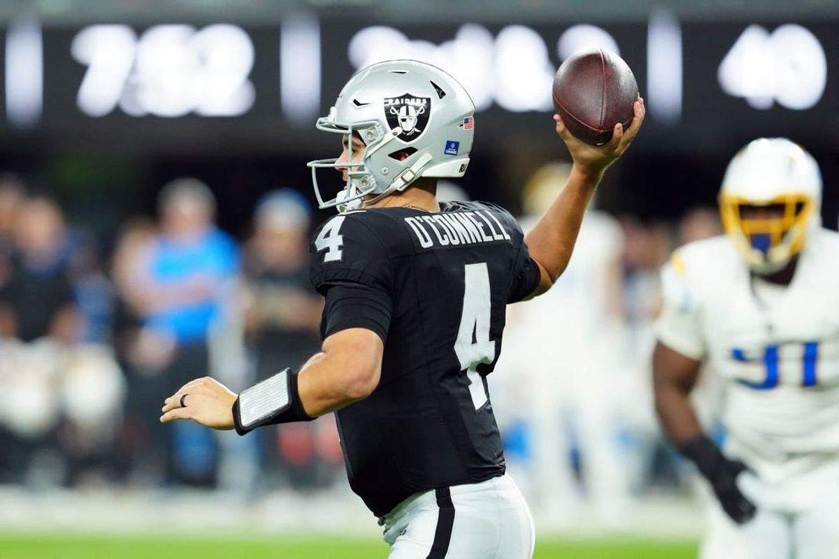 Dec 14, 2023; Paradise, Nevada, USA; Las Vegas Raiders quarterback Aidan O'Connell (4) throws a pass in the fourth quarter against the Los Angeles Chargers at Allegiant Stadium.