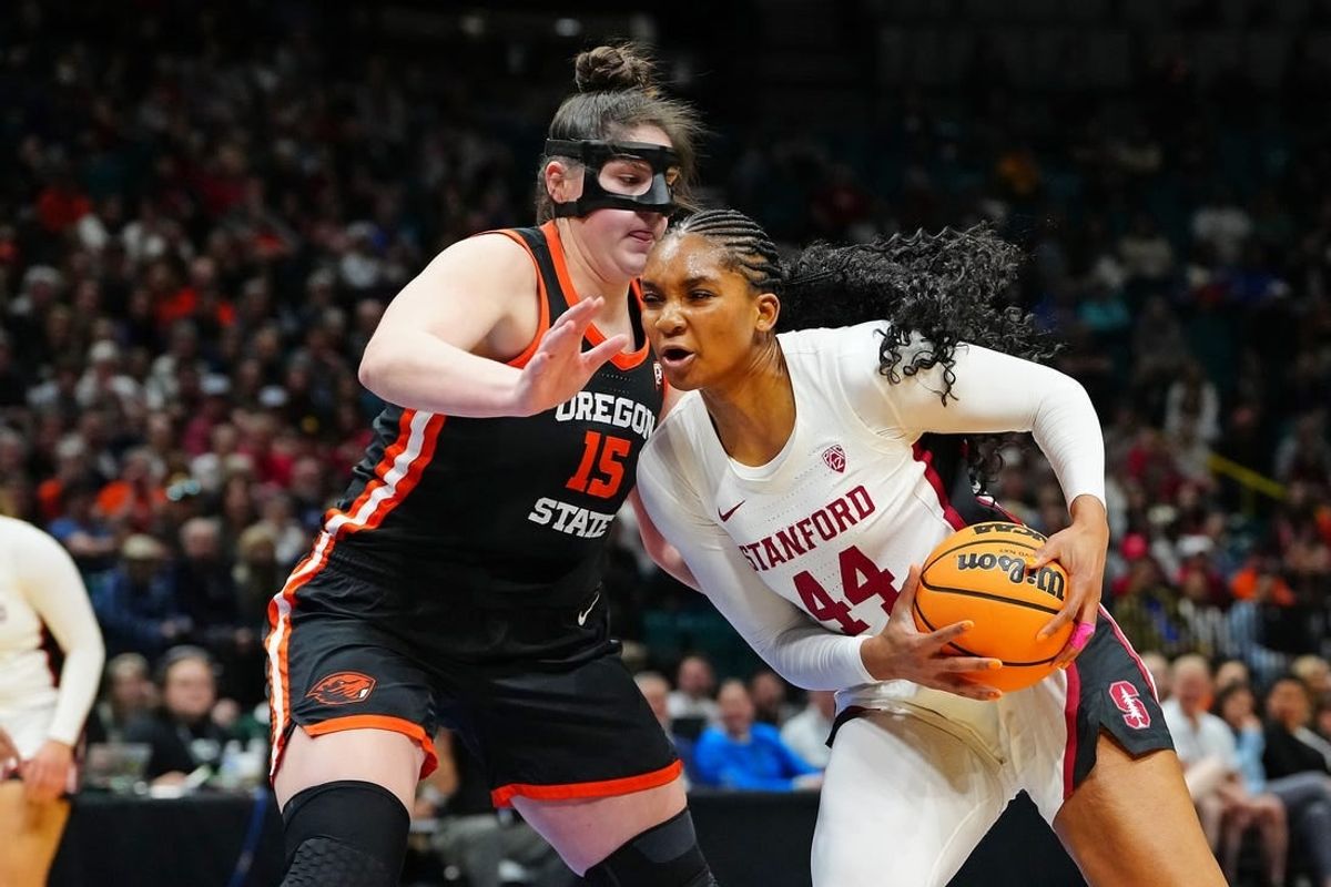 Mar 8, 2024; Las Vegas, NV, USA; Stanford Cardinal forward Kiki Iriafen (44) drives the lane against Oregon State Beavers forward Raegan Beers (15) during the fourth quarter at MGM Grand Garden Arena.