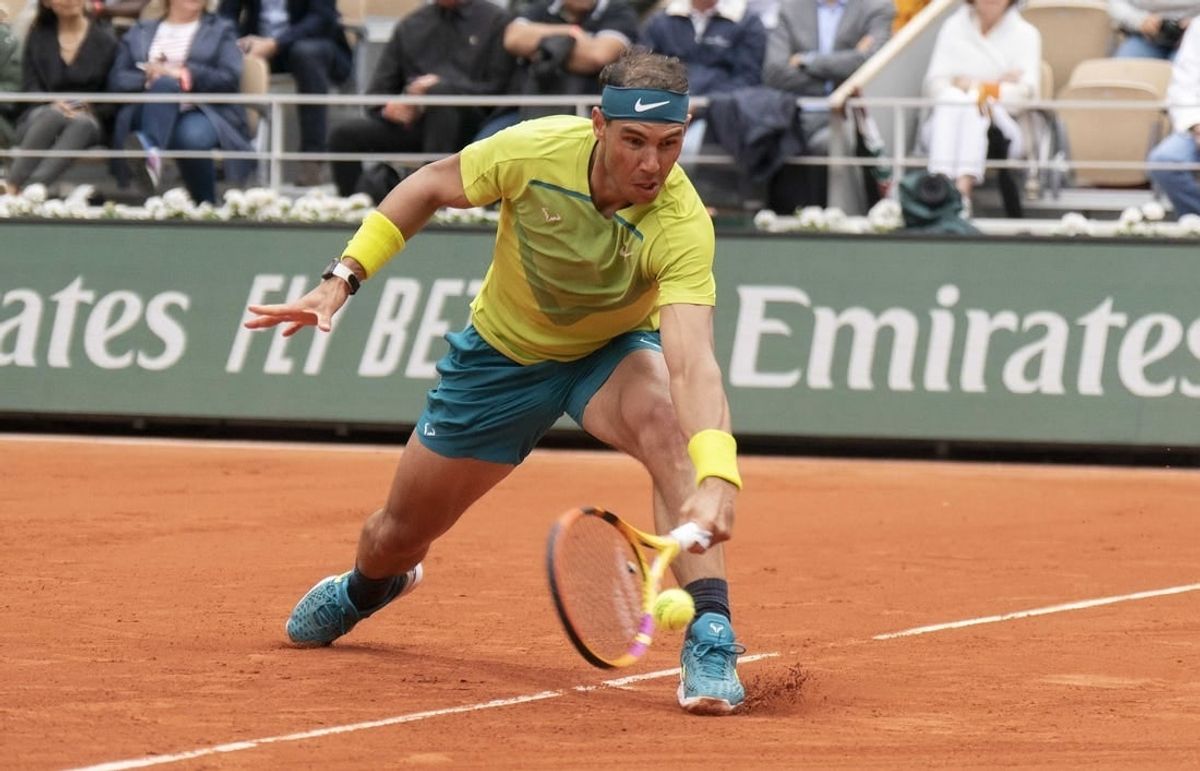 May 23, 2022; Paris, France;Rafael Nadal (ESP) returns a shot from Jordan Thompson (AUS) during their match on day two of the French Open at Stade Roland-Garros.