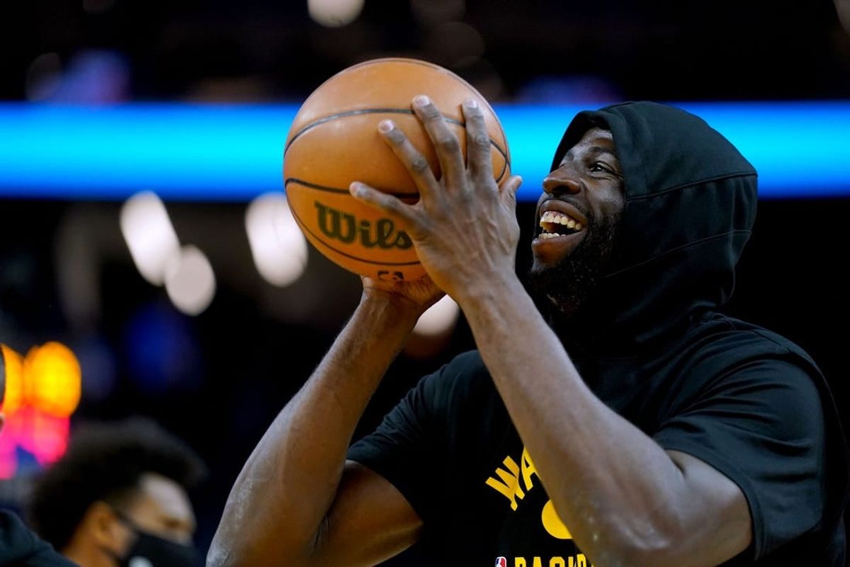 Nov 24, 2021; San Francisco, California, USA; Golden State Warriors forward Draymond Green (23) smiles during warmups before the start of the game against the Philadelphia 76ers at the Chase Center.
